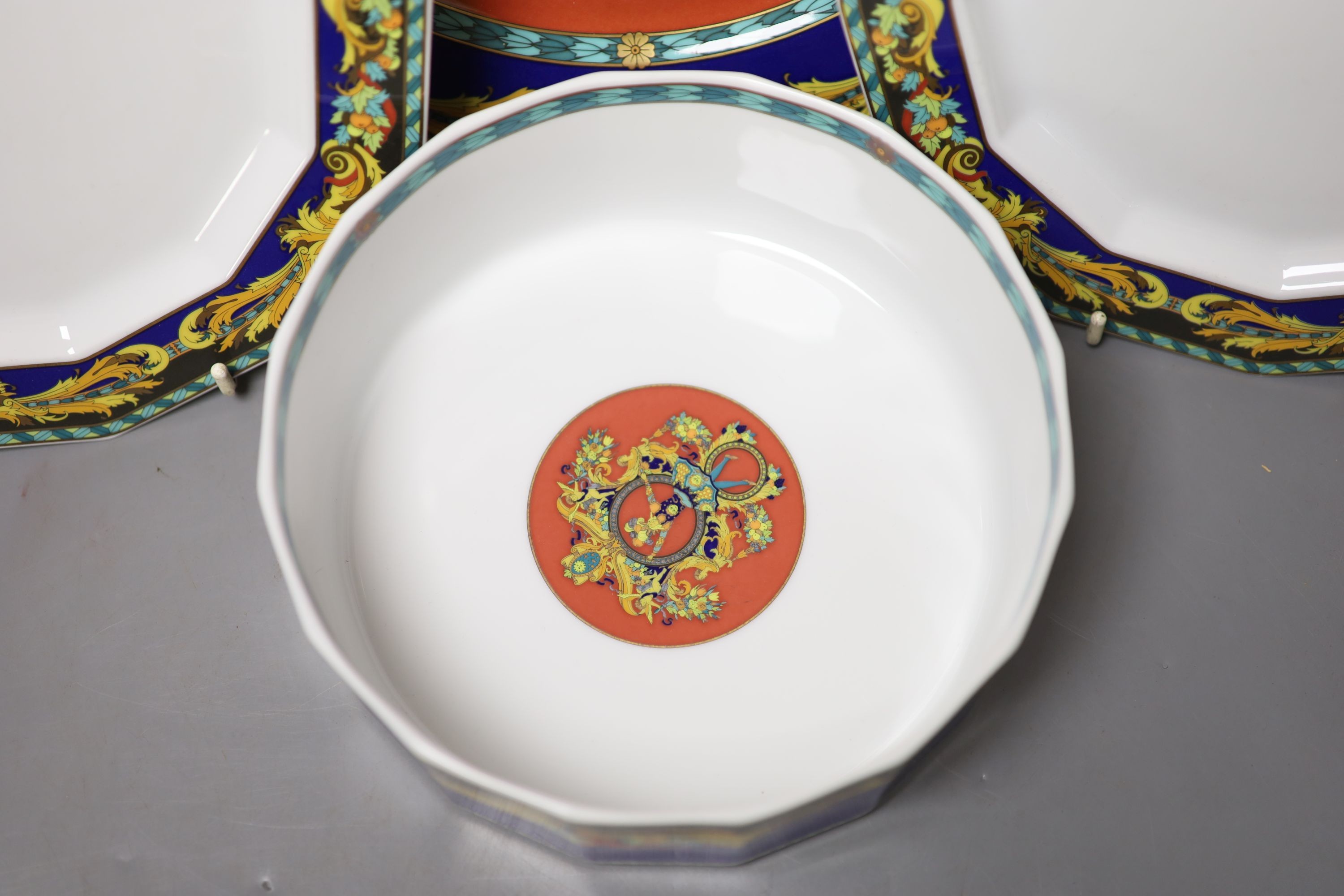 A group of Versace Rosenthal Le Roi Soleil plates and coffee cups and saucers and a bowl, 18.5cm, ten in total